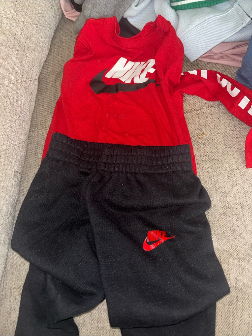 Nike Red Top with Black Jogger Bottoms